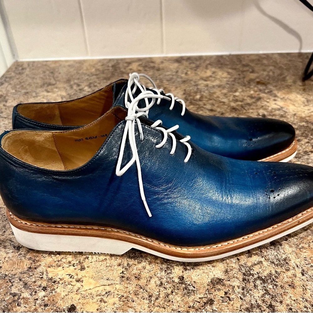 Ugo Visare men’s lace up dress shoe. Blue leather with white sole.